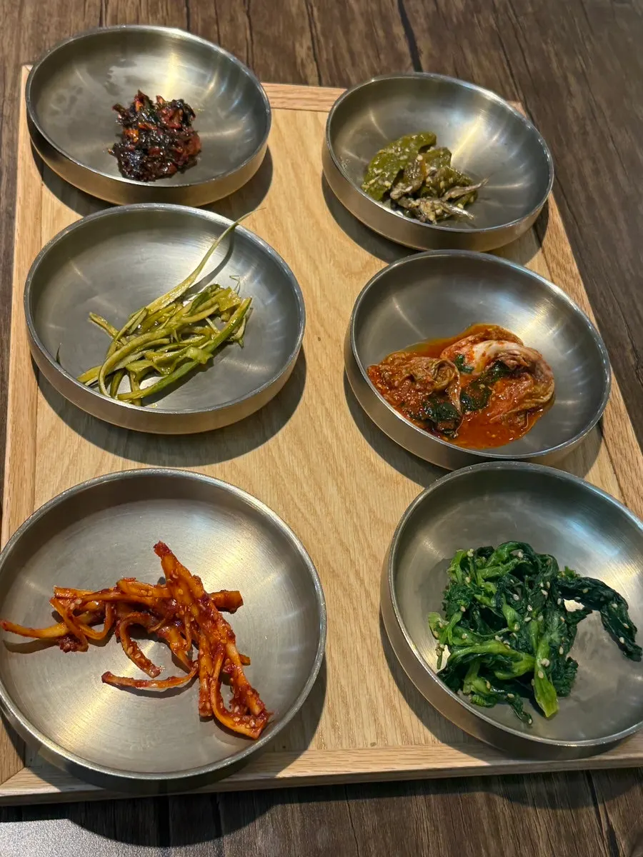 Neatly plated Korean set meal side dishes