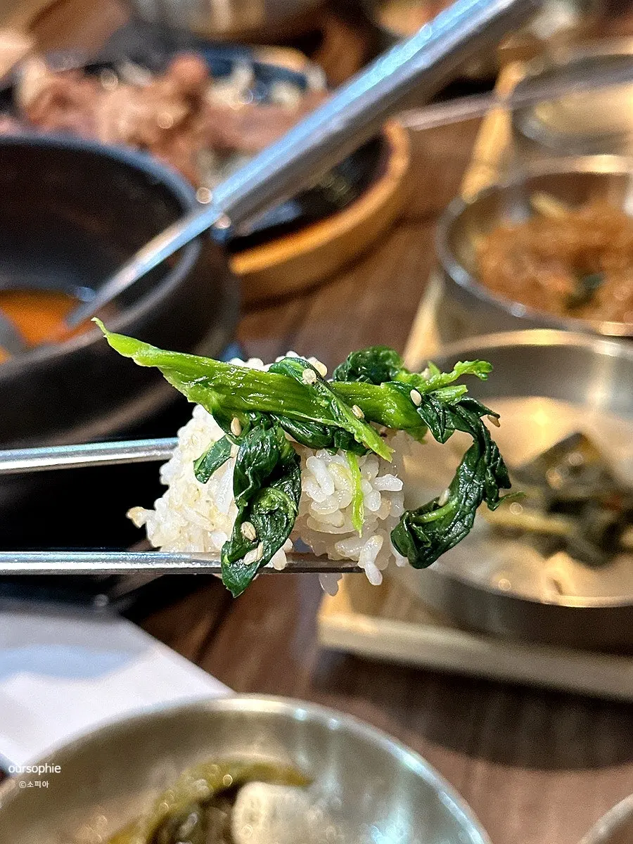 A spoonful of rice topped with namul