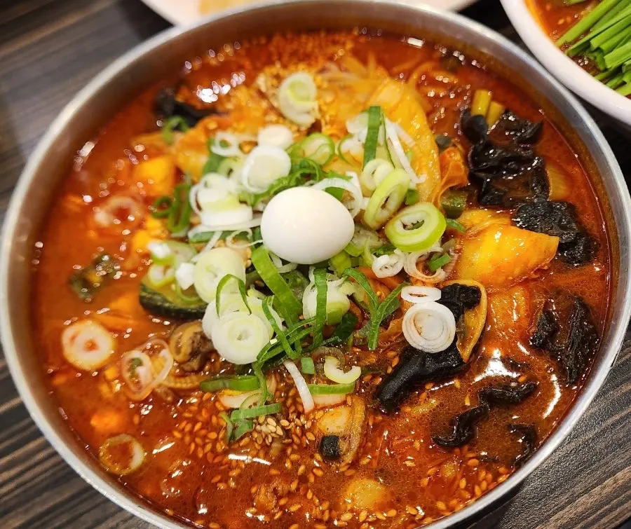 A bowl of soft tofu jjamppong loaded with tofu