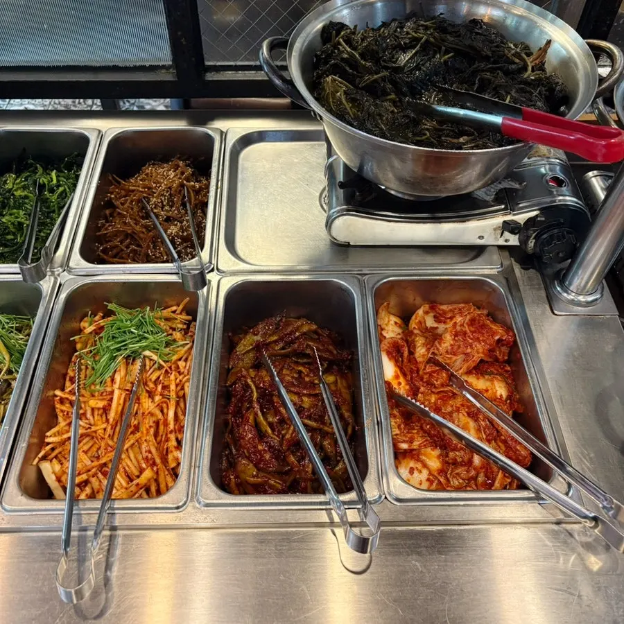 Lettuce wraps and assorted Korean side dishes
