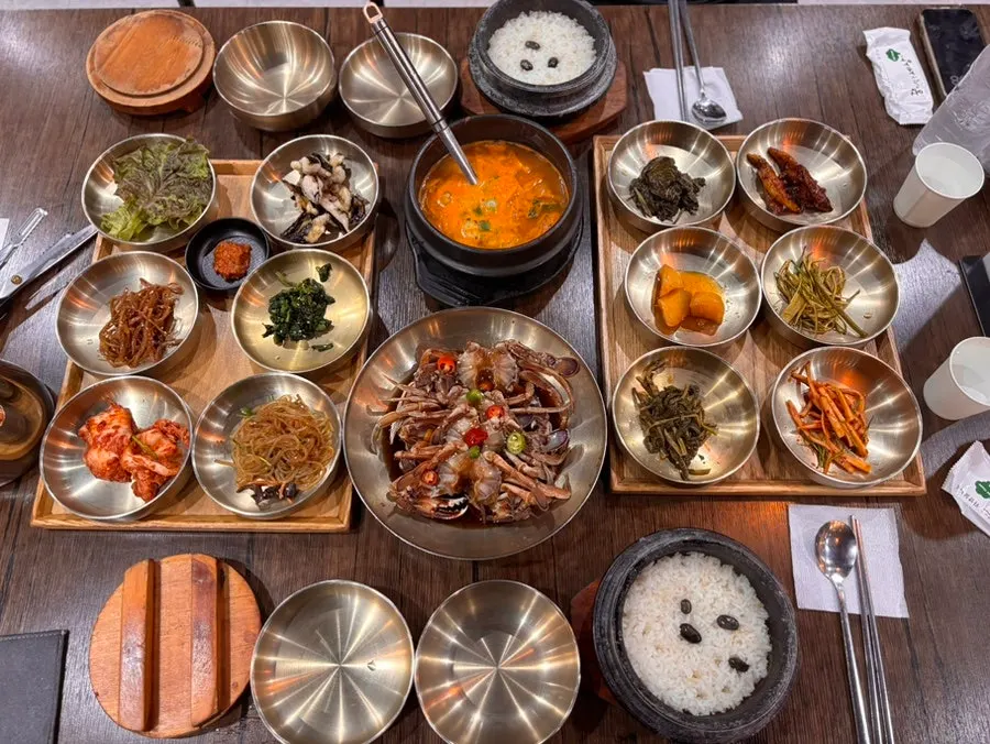 A variety of Korean side dishes arranged on the table