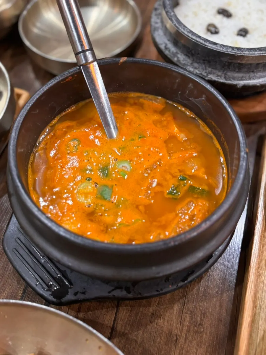 Pot-rice meal served with soy-marinated crab