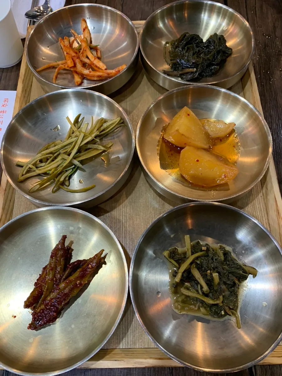 Korean table set with a variety of side dishes