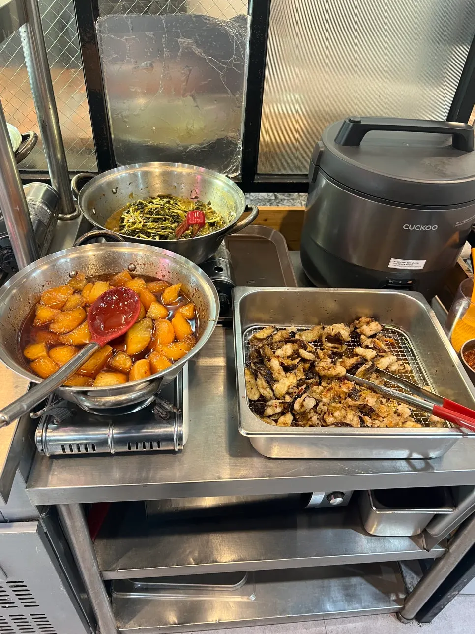 Self-bar side dishes kept warm on burners