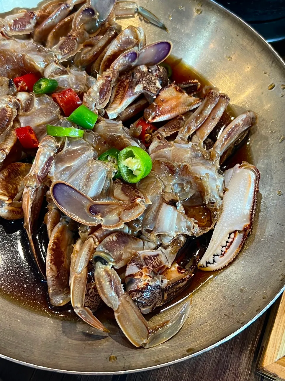 Close-up of four soy-marinated crabs
