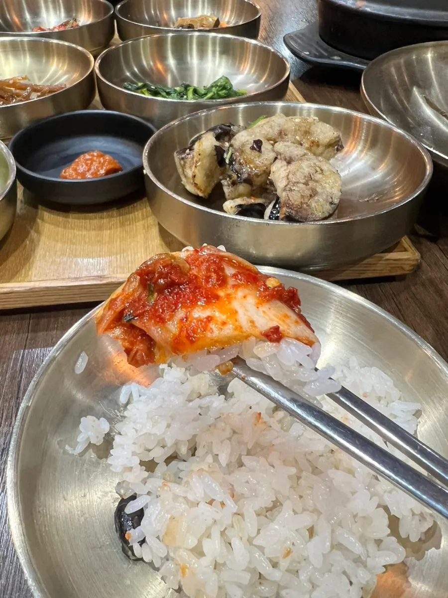A piece of mackerel placed on top of rice