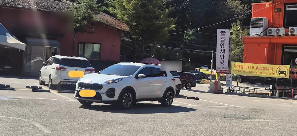 Marked parking spaces at the Korean restaurant's parking lot