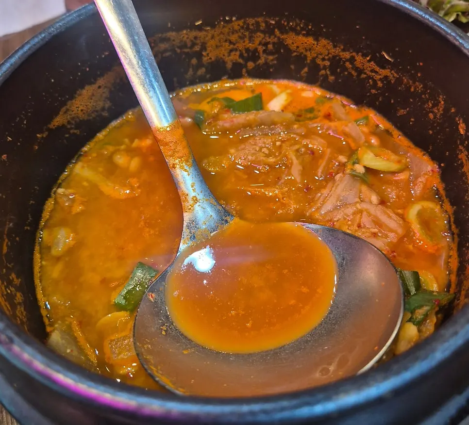 Cheonggukjang served alongside the side dishes