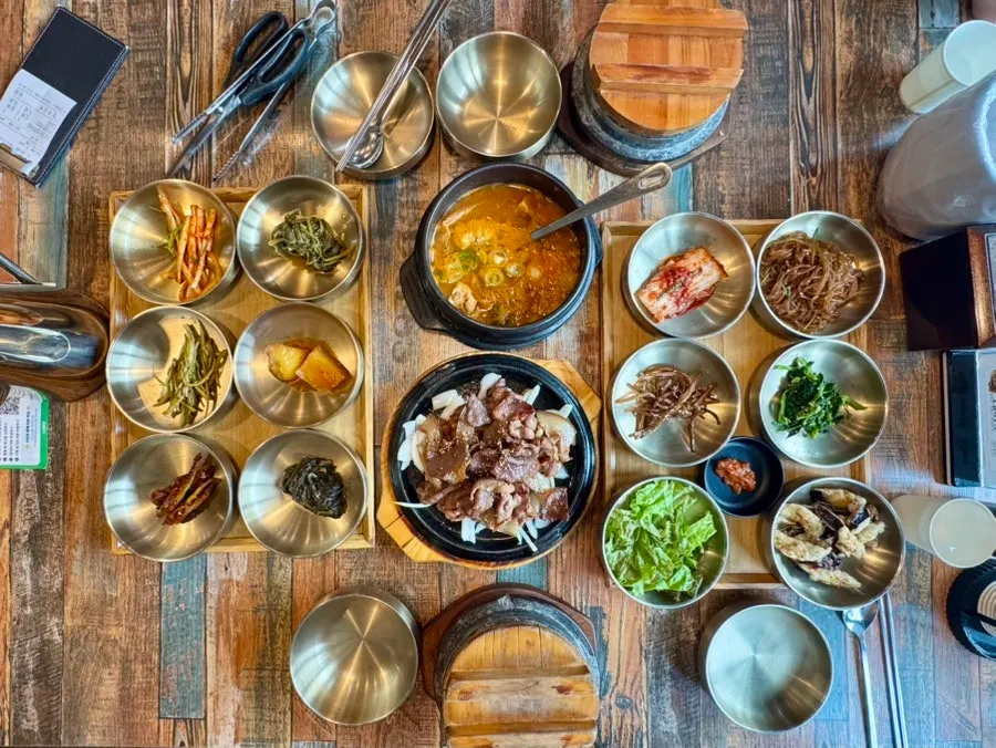 Table fully spread with the set meal for two