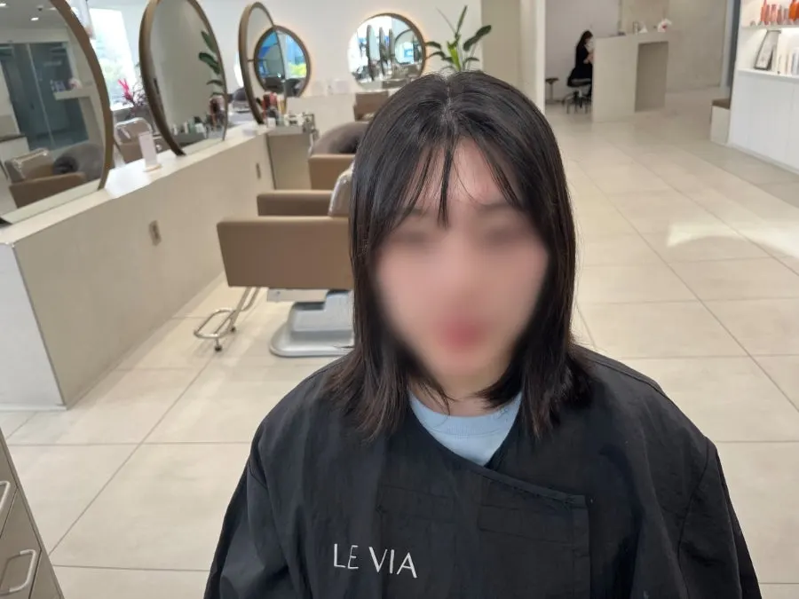 See-through bangs at an awkward in-between length
