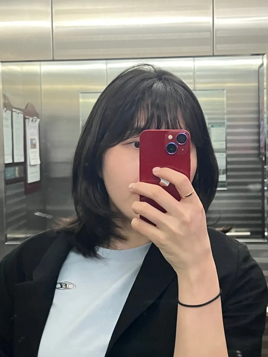 Finished layered cut with bold curls