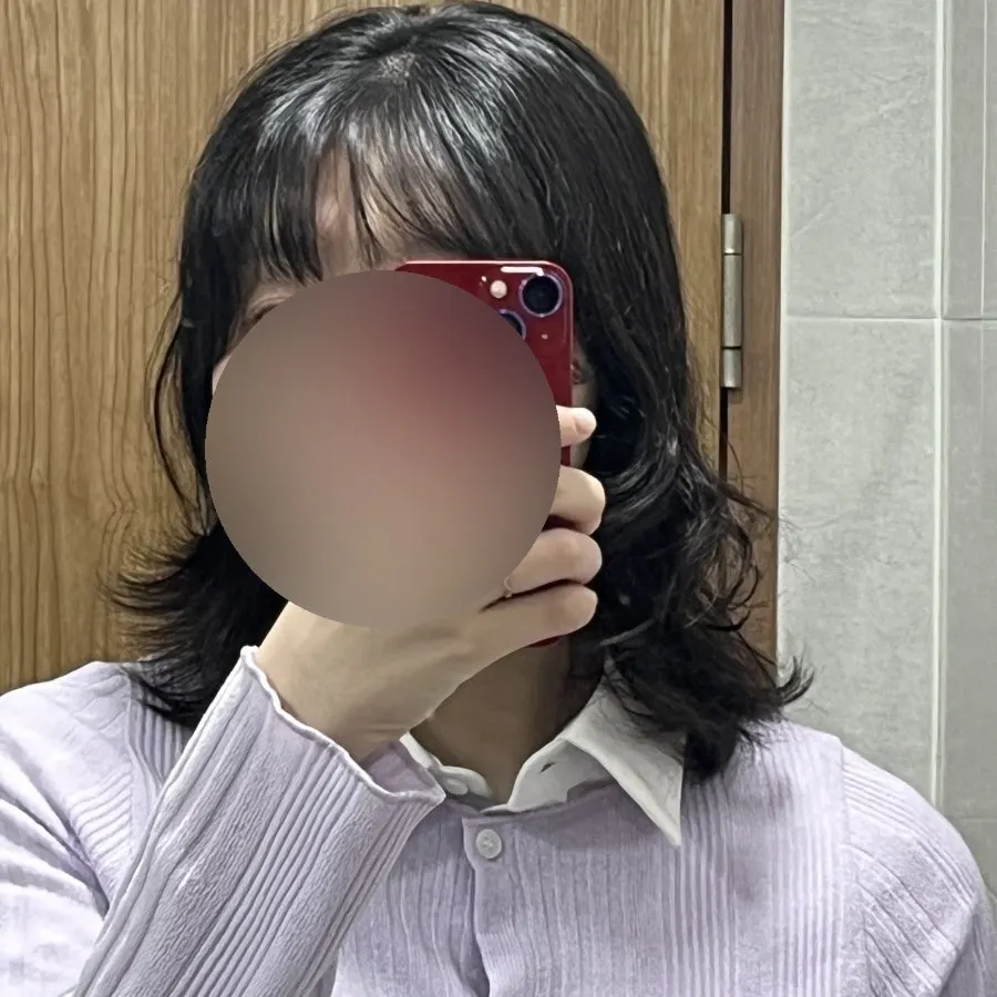 Short side hair straightened with a flat iron