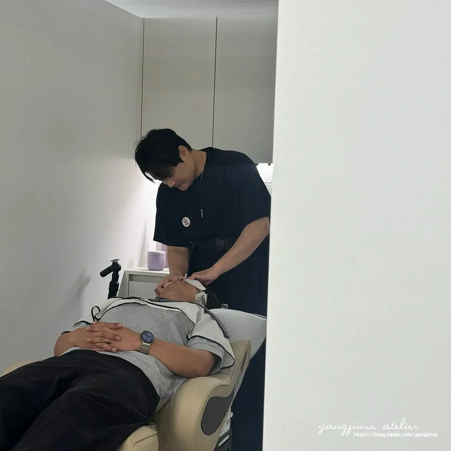 Husband getting his hair shampooed