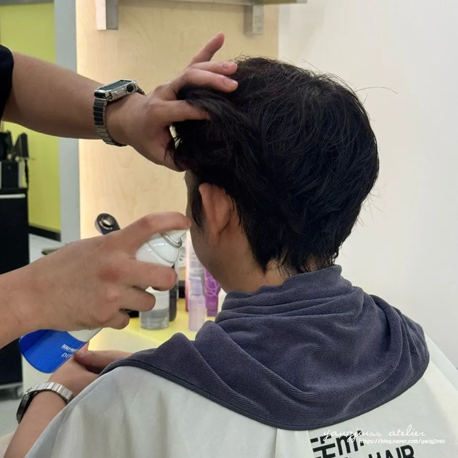 Detailed finishing touches on the men's cut