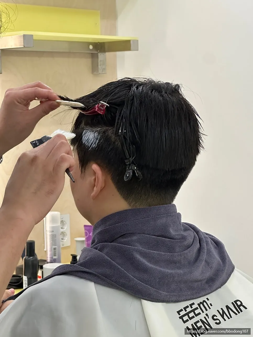 Preparing for the down perm after applying scalp protectant