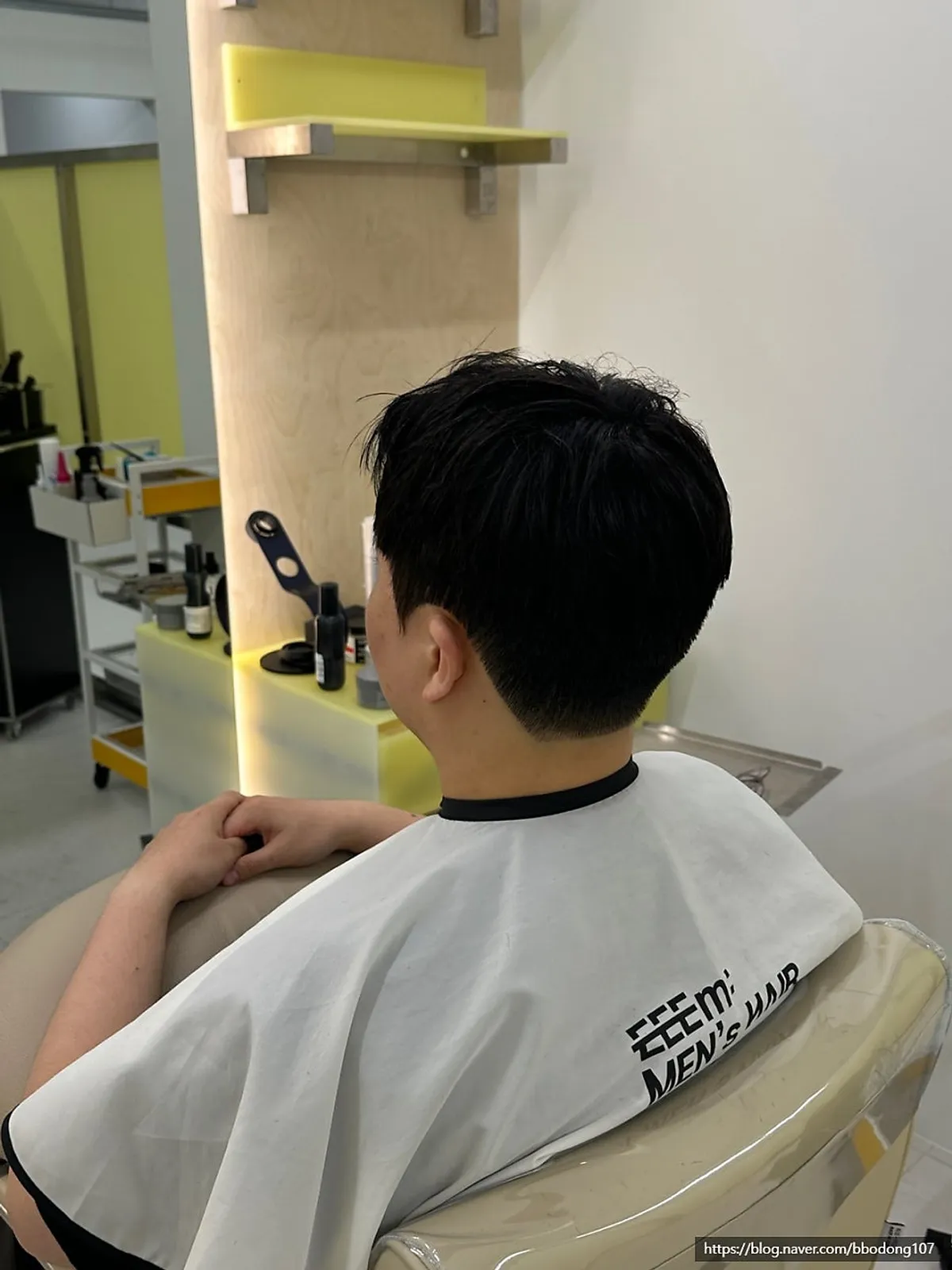 Front view of finished cut and down perm