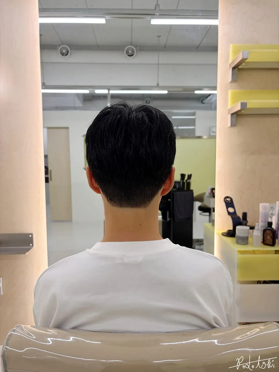 Neatly trimmed back hairline