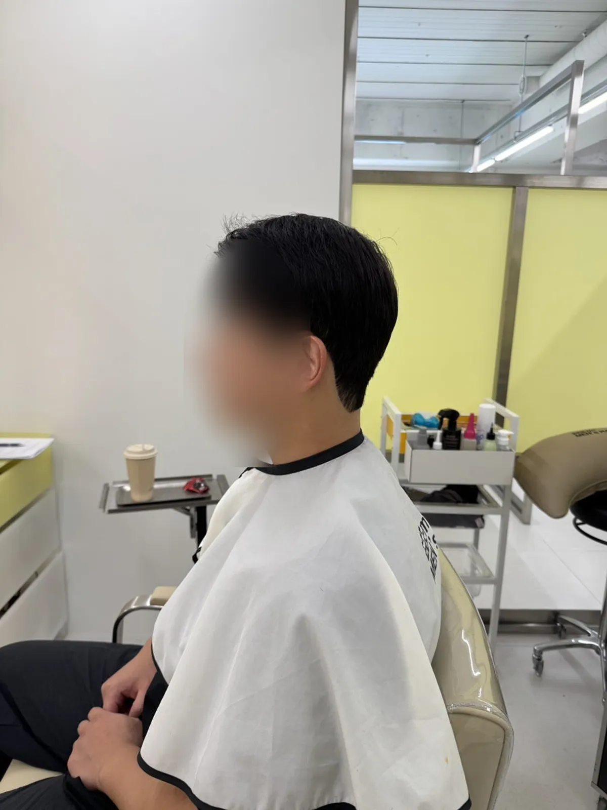 Tidied men's hair after the cut and down perm