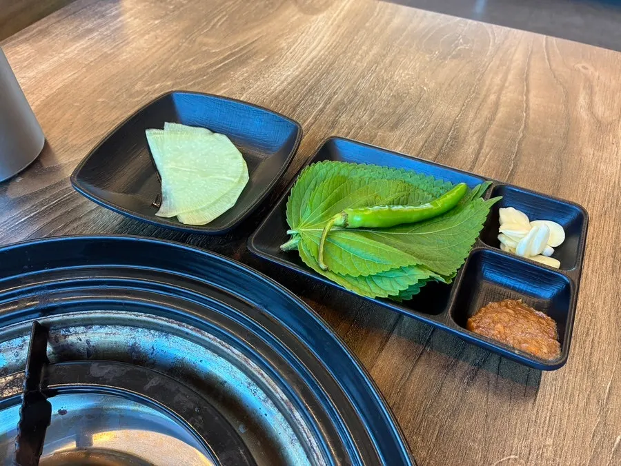 Omega-3 supplements placed on plates for each diner