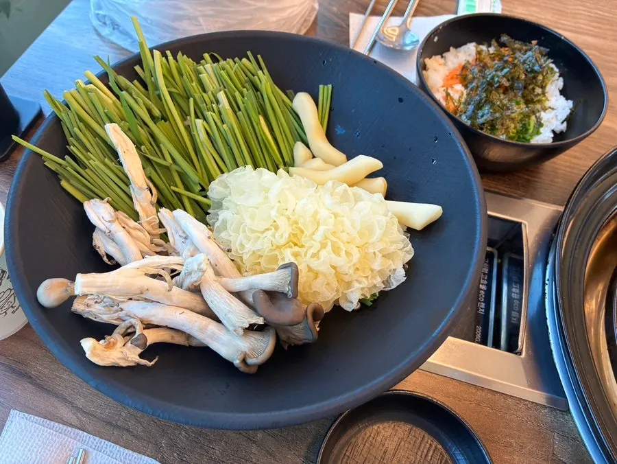 Self-serve bar with gondre rice and mother-in-law's fresh kimchi