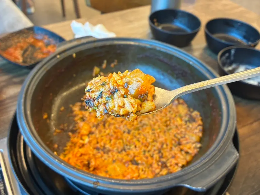 Tricolor fried rice cooked in the leftover stew sauce