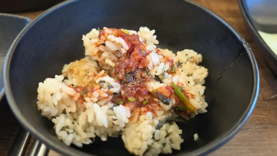 Gondre mushroom rice topped with seasoning sauce and sesame oil