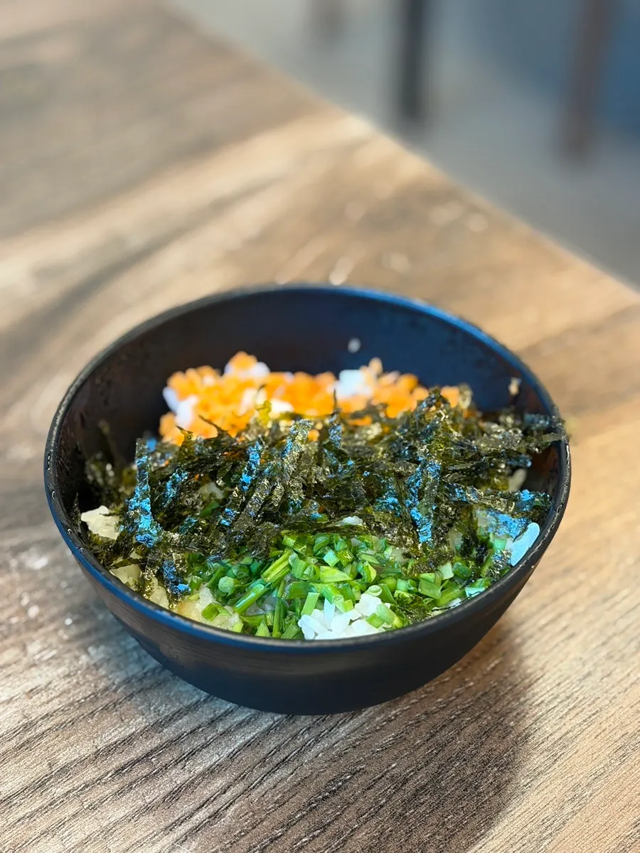 Rice and side dishes scooped from the self-serve bar
