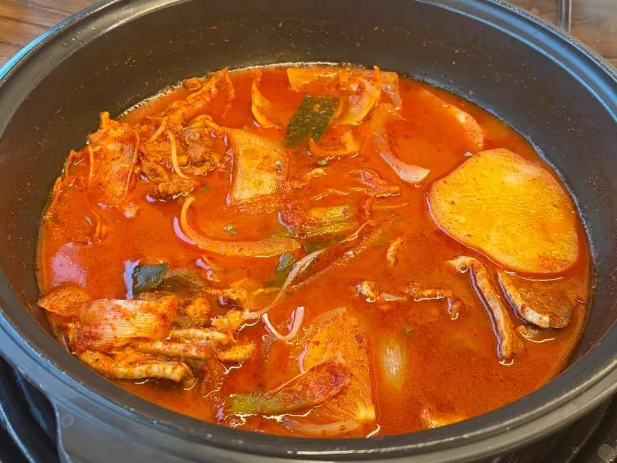 Duck stew pot starting to boil
