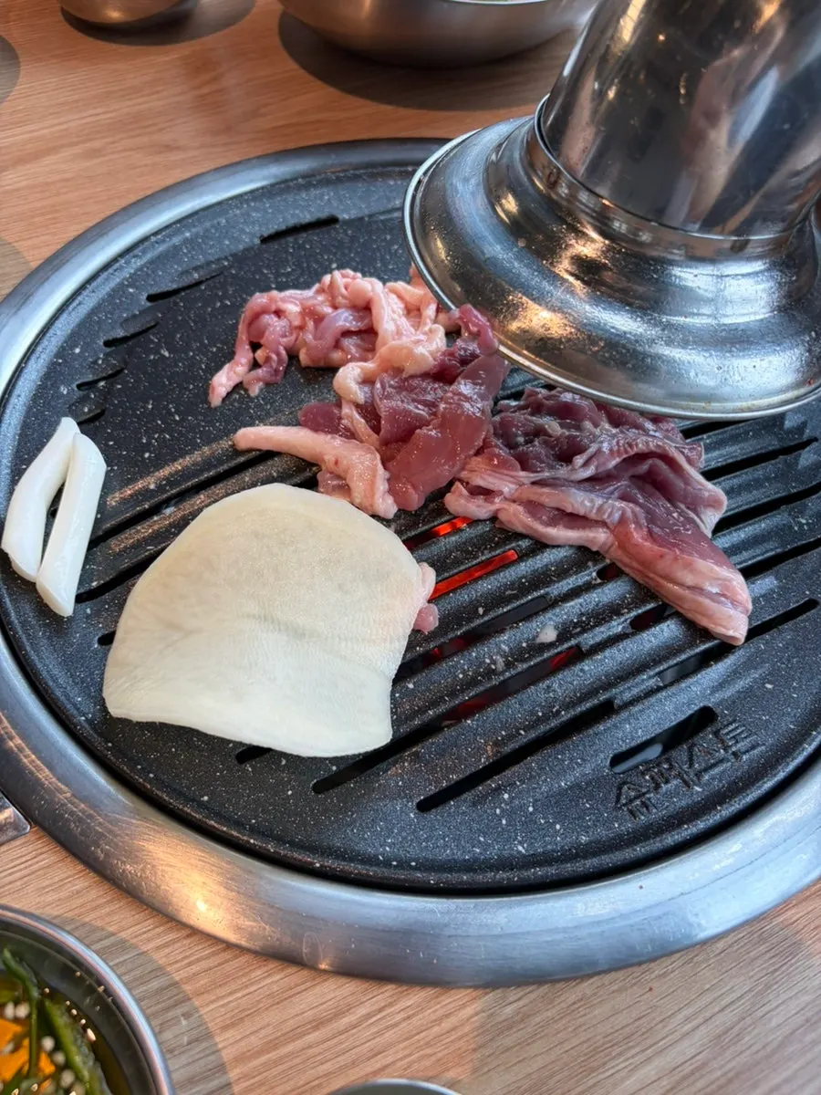 부추가 듬뿍 들어간 진한 오리곰탕 국물