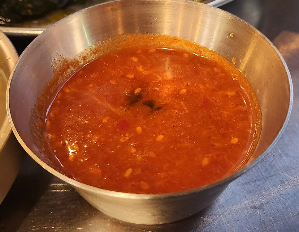 Grilled meat dipped in myeoljeot sauce