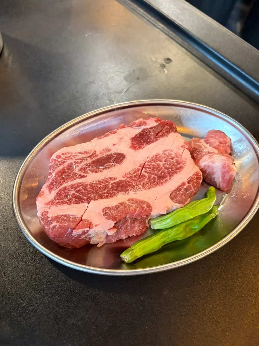 Extra pork neck ordered because the kids ate so well
