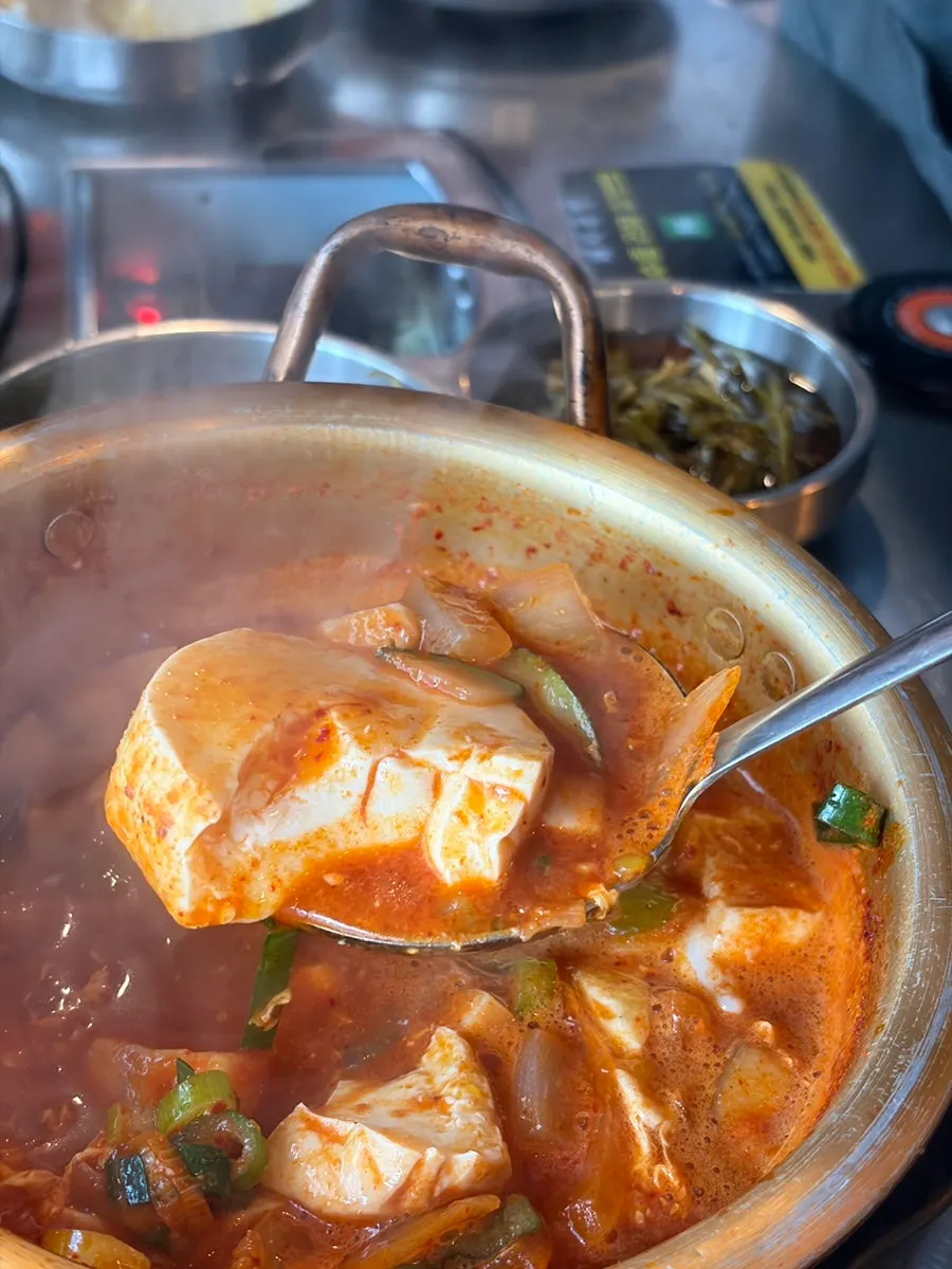 Spicy soft tofu stew eaten with the meat