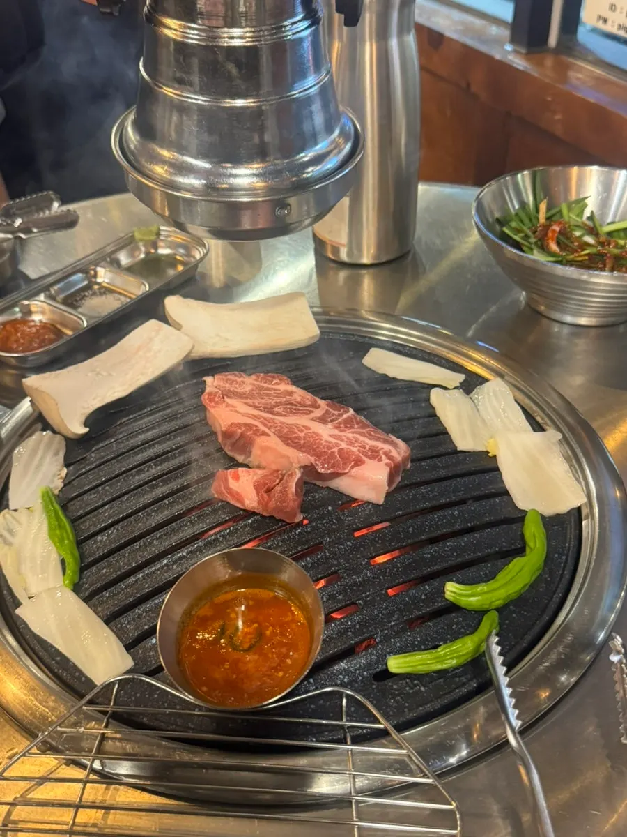 Raw thick-cut pork neck at Dwaeji Gongbang
