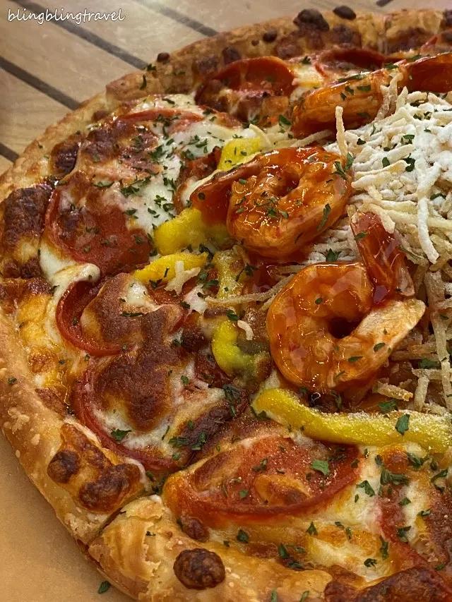 Ambrosia pastry pizza topped with potato flakes