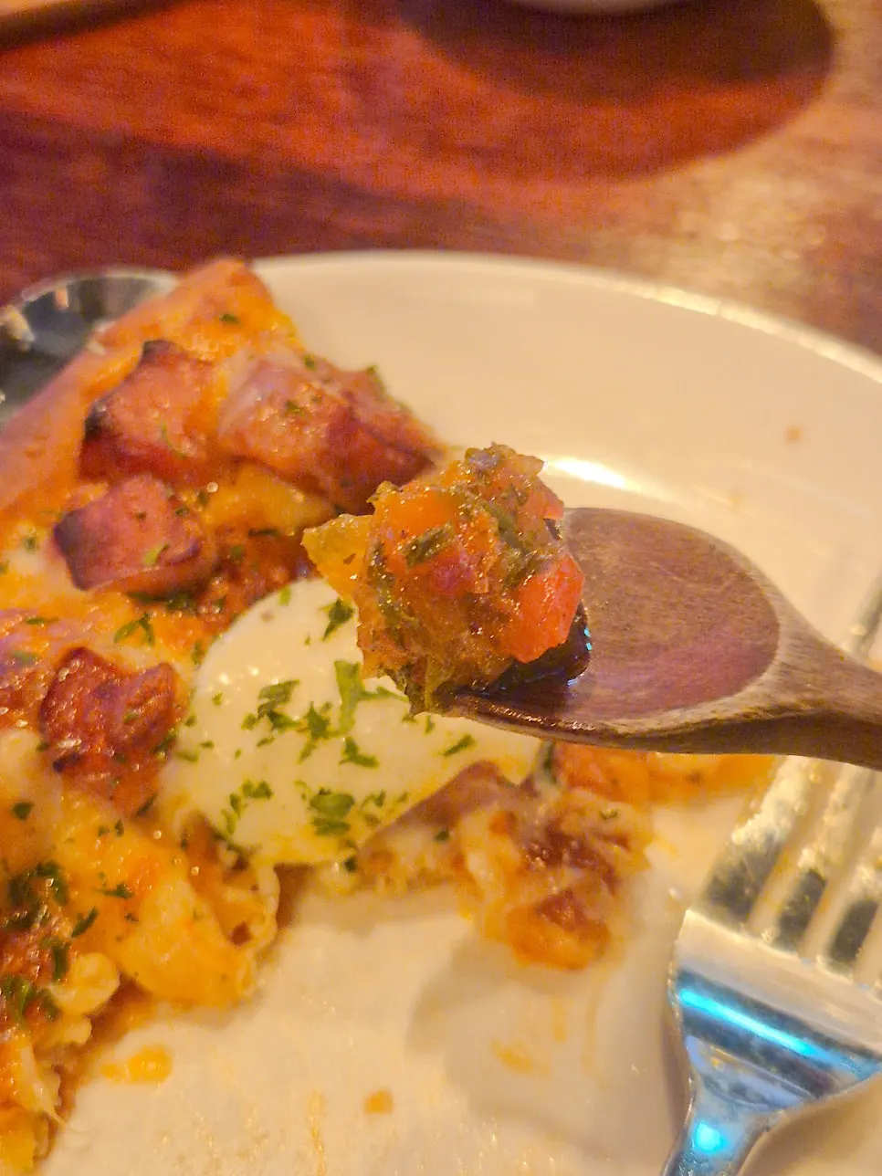 House-made salsa criolla sauce drizzled over the pizza