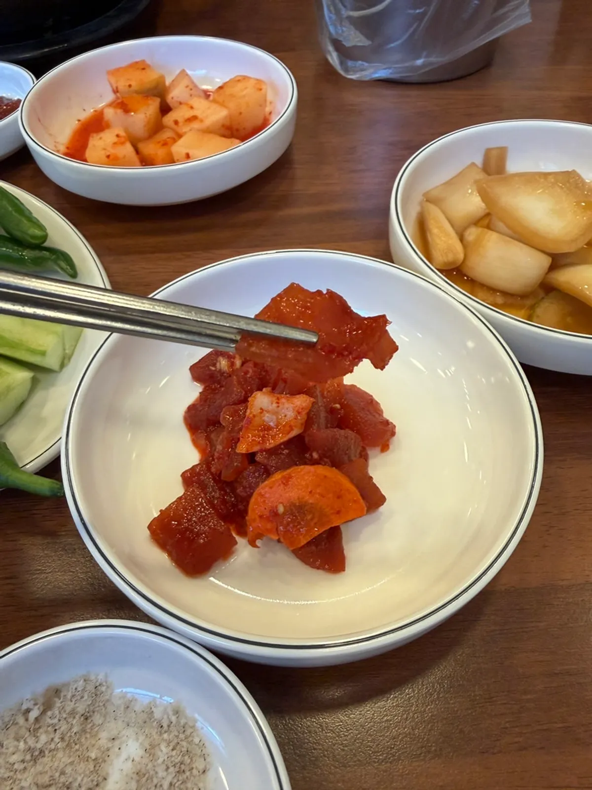 Side dish spread with pickled onion and cucumber