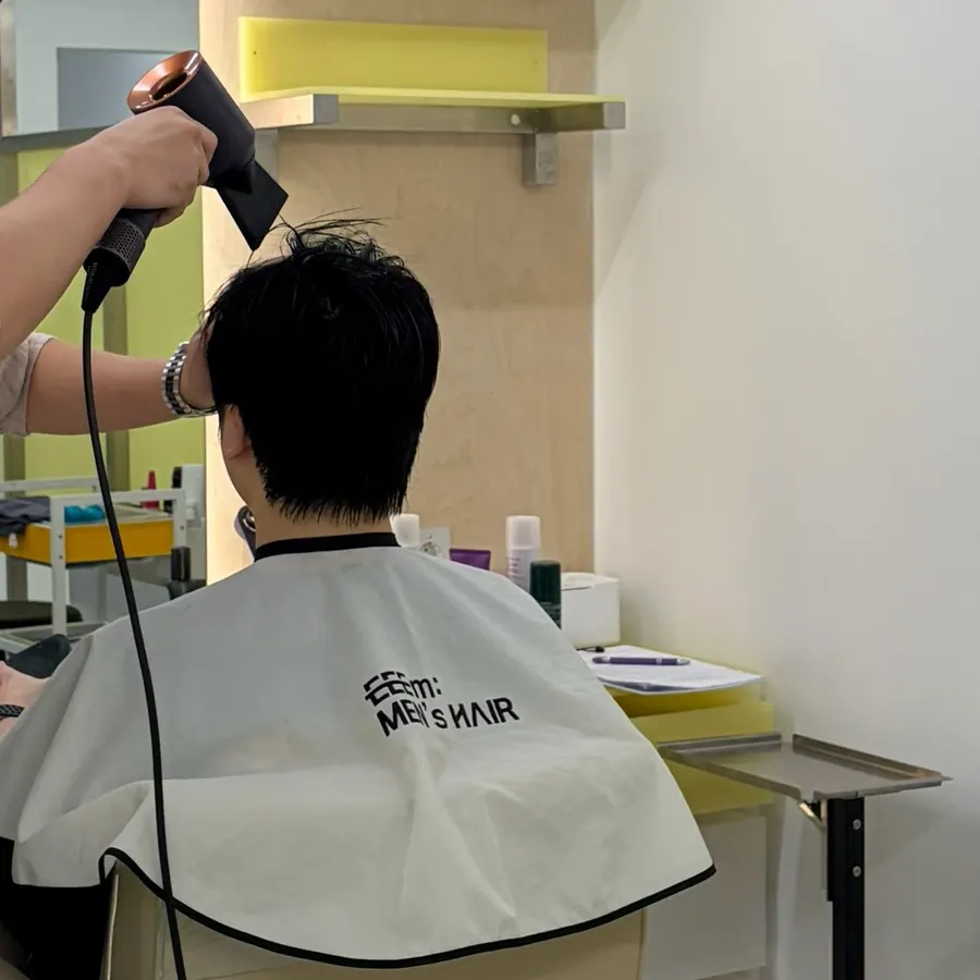 Preparing for the down perm after the initial cut