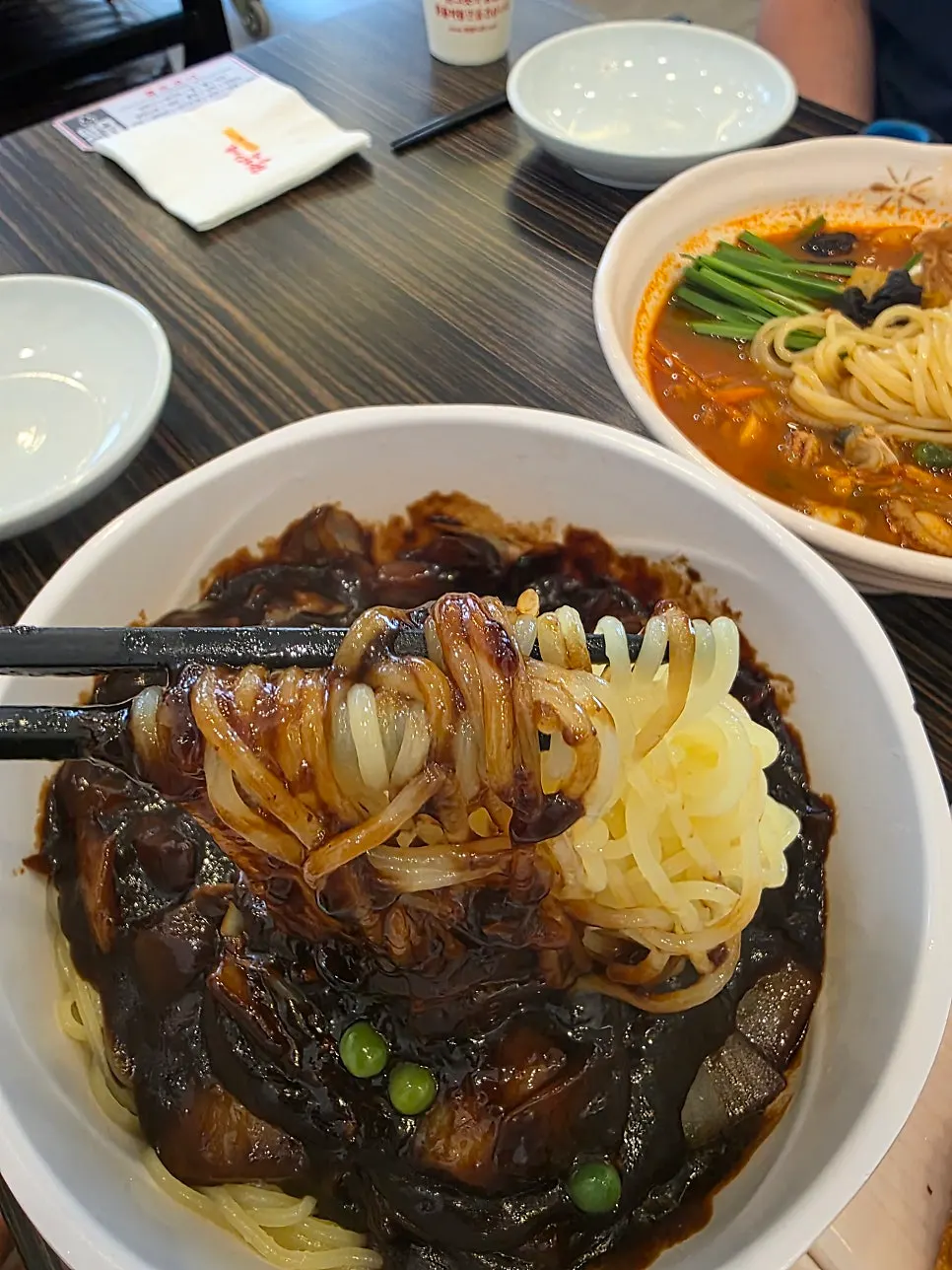 Close-up of jjamppong broth and noodles