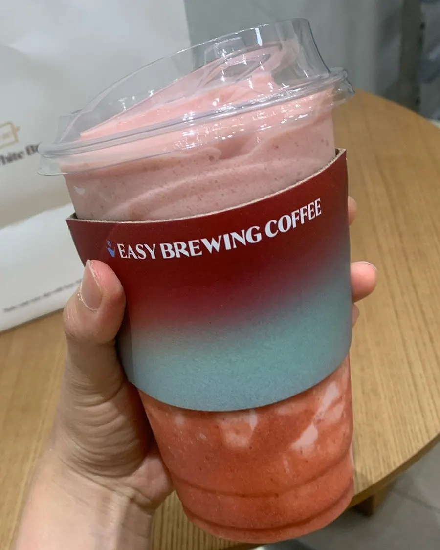 Strawberry drink with a piece of milk bread