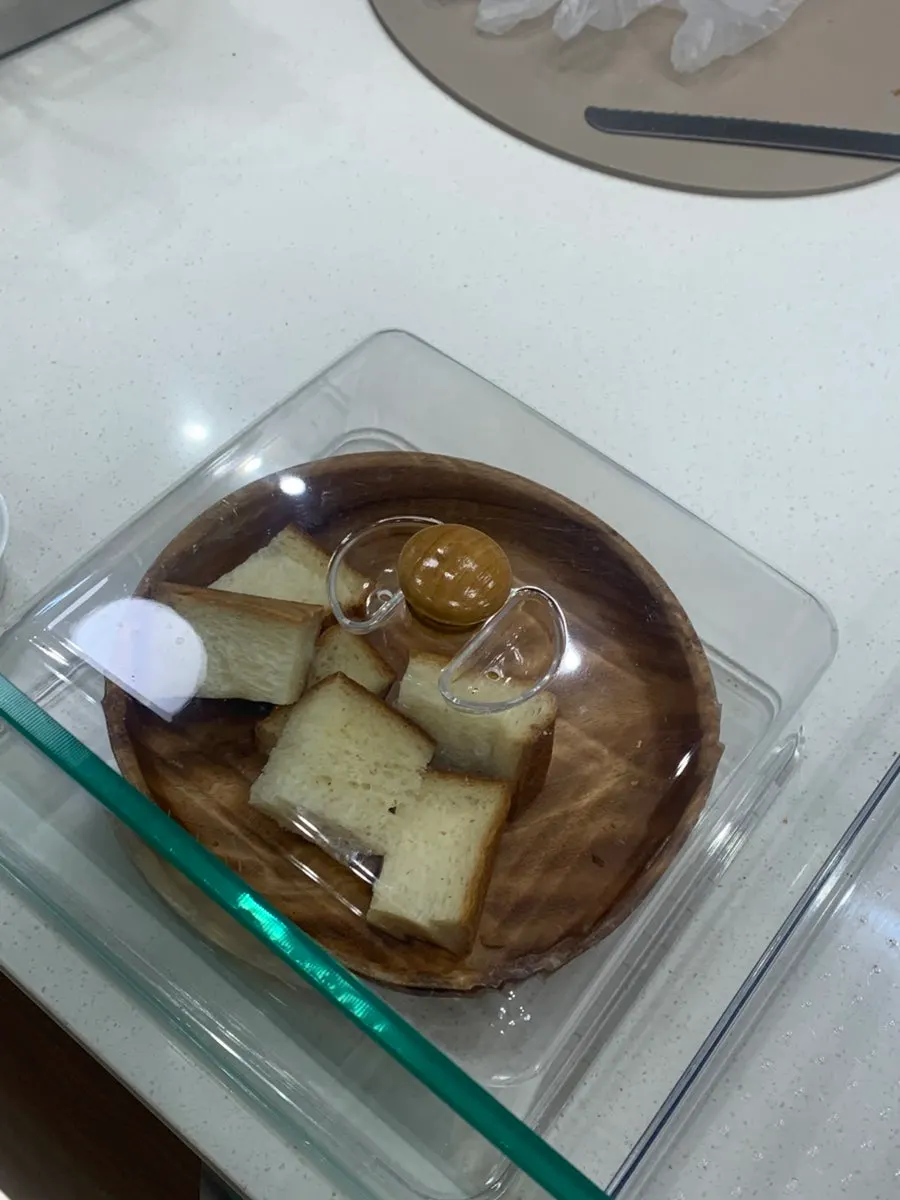 Display shelf with whole loaves of milk bread