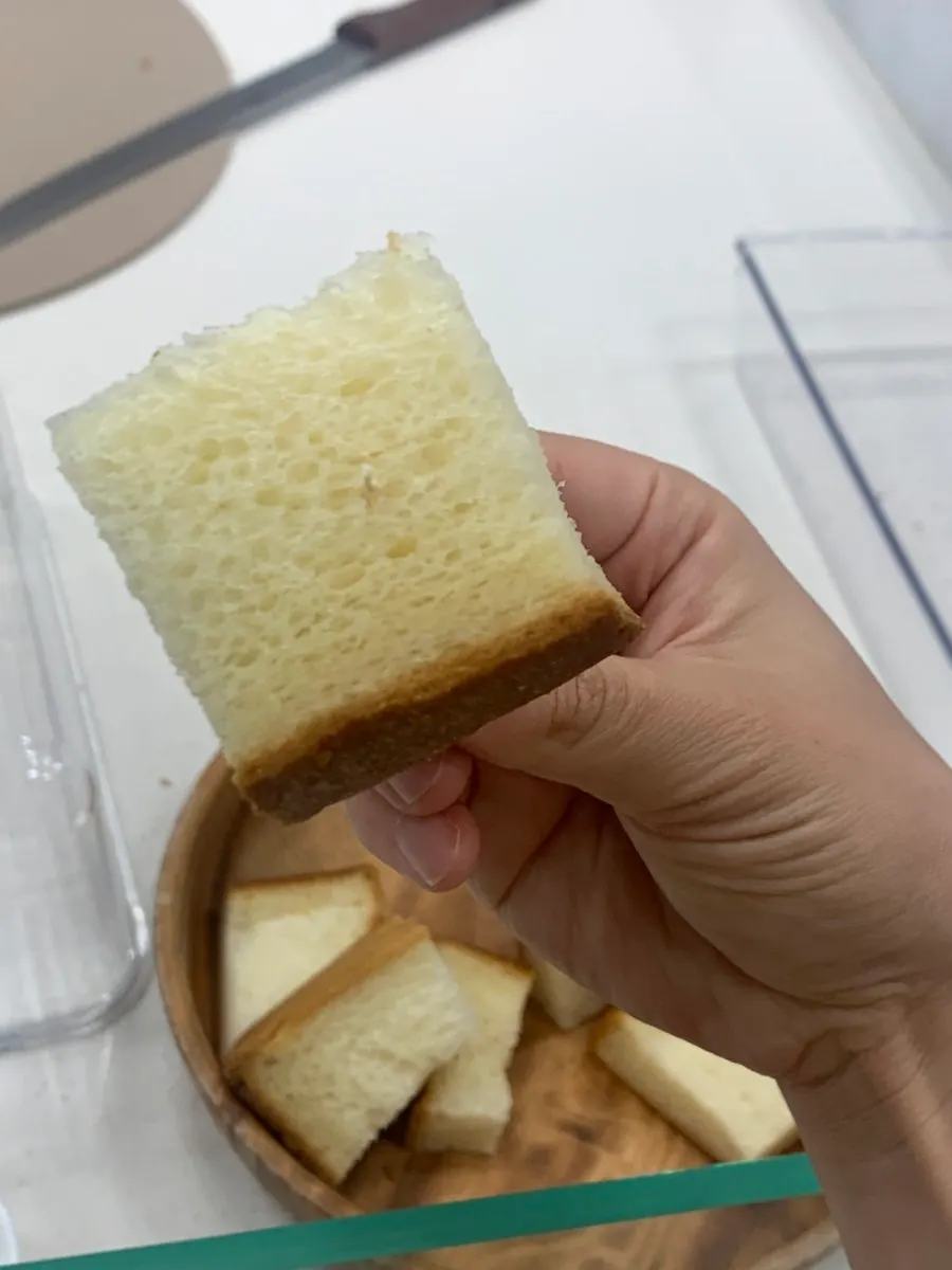 Sample milk bread tray covered with a clear lid