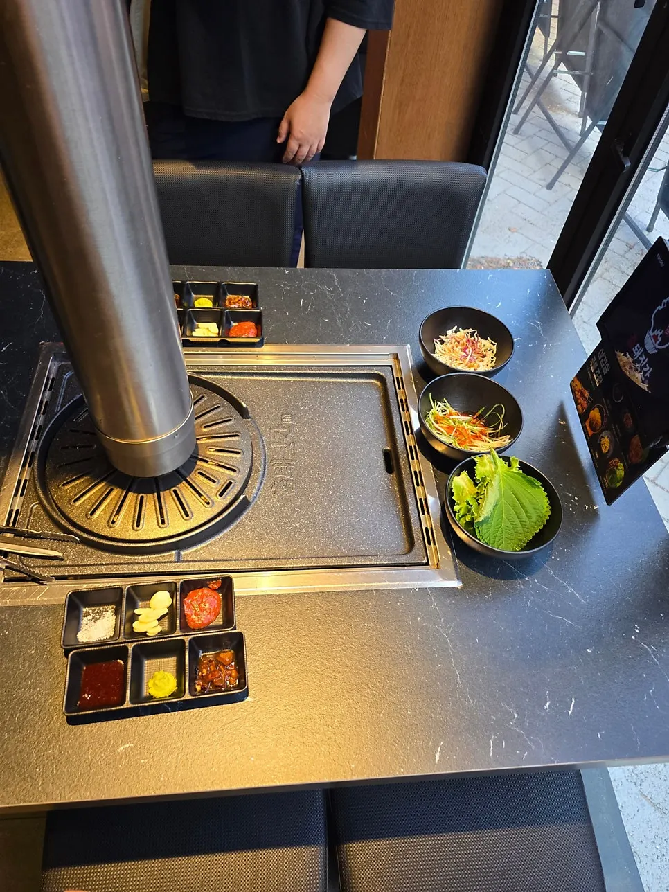 Side condiments preset at each table
