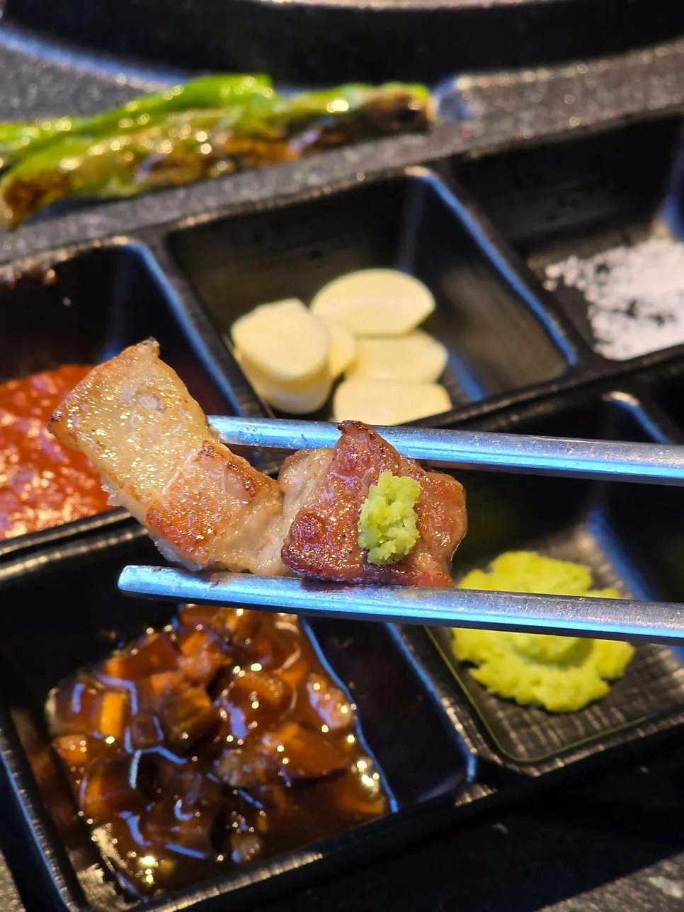 Pork belly piece topped with shiitake wasabi