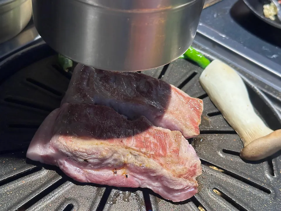 Pork jowl on the grill