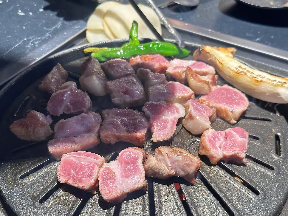 Well-cooked pork neck and jowl