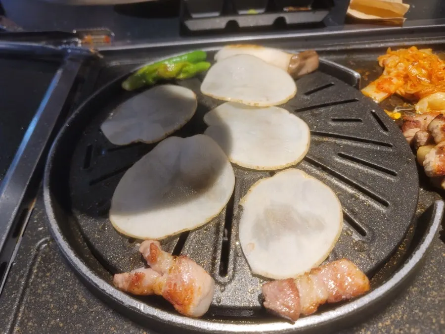 Extra pork belly cooking on the grill