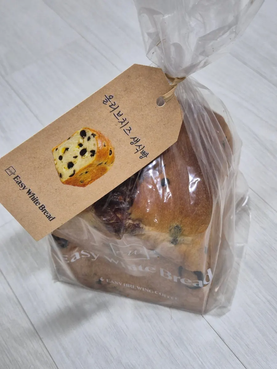 Purchased olive cheese fresh milk bread
