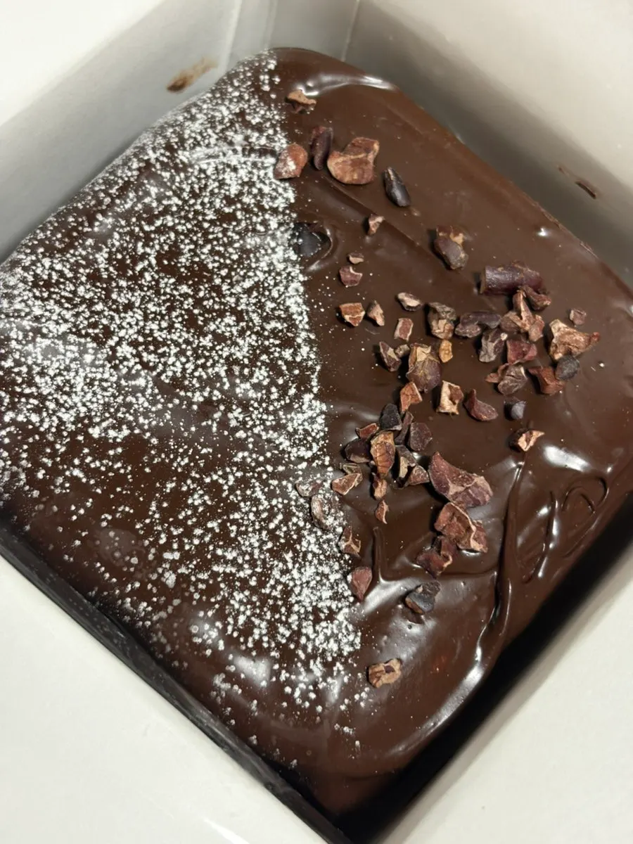 Top of the deep chocolate milk bread taken out of the box