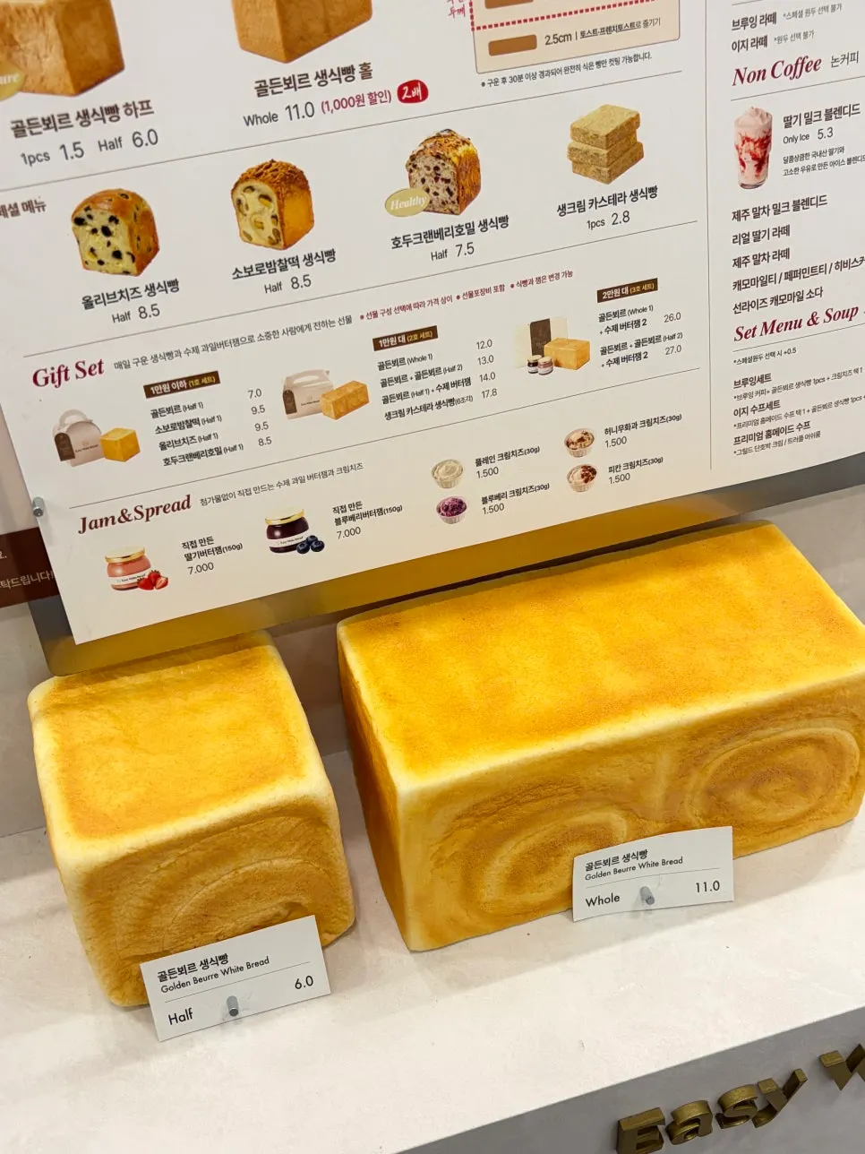 Customers lining up next to the milk bread display counter