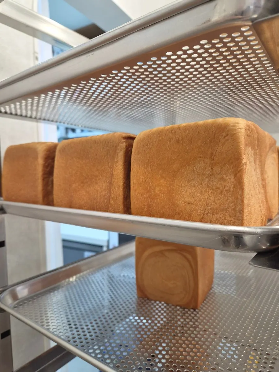 The Golden Beurre milk bread in half size